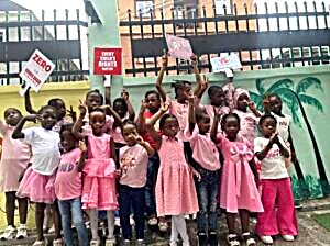 Girls participating in a DEVADI gender-based violence awareness campaign